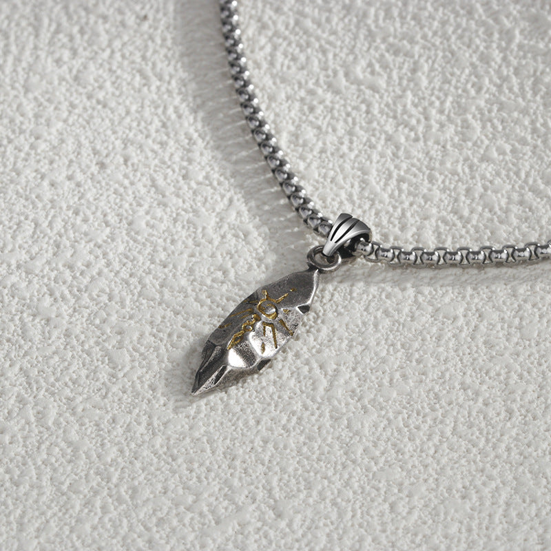 Silver necklace with a pendant on a light gray background