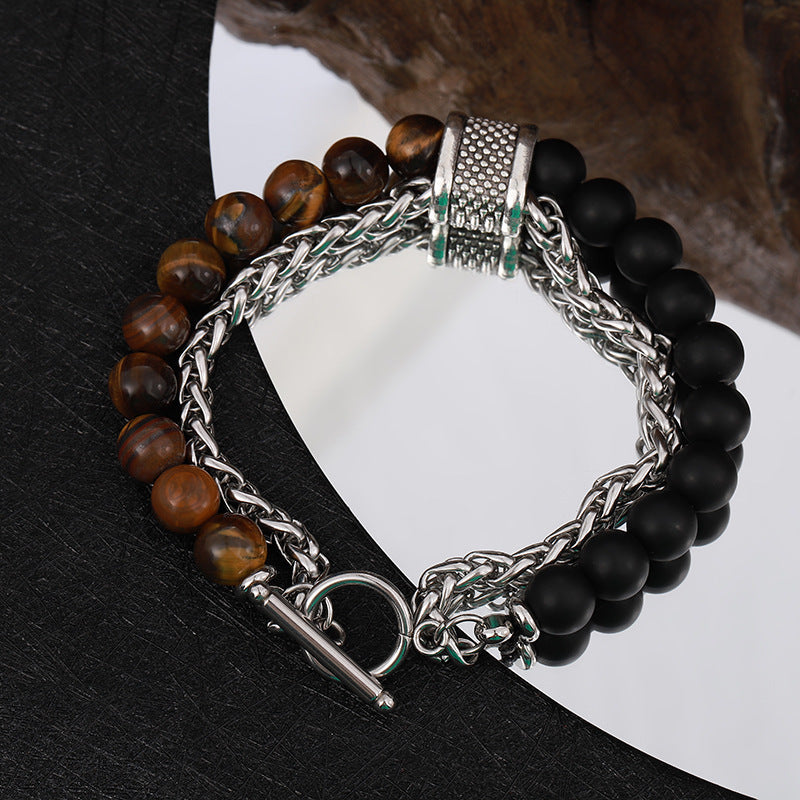 Bracelet with black and brown beaded design on a black and white background
