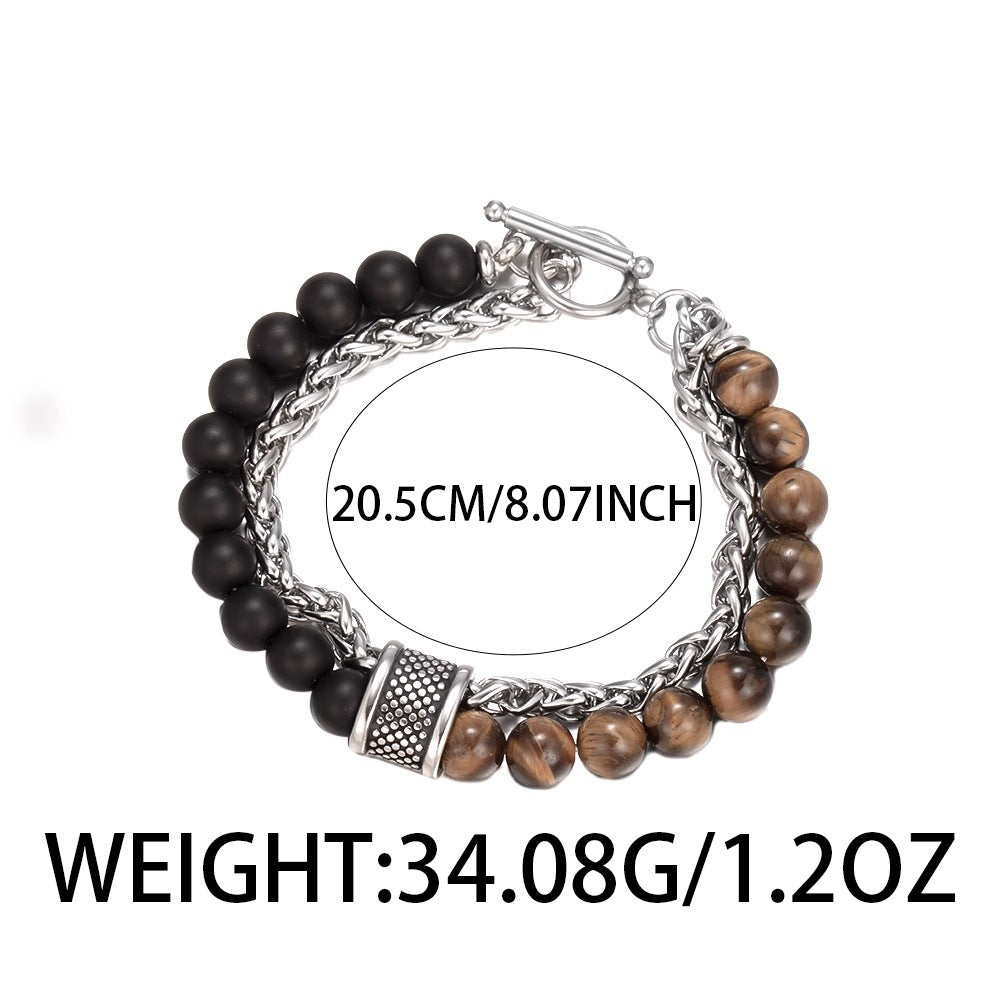 Bracelet with wooden beads and metal chain on a white background